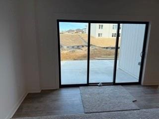 entryway featuring baseboards