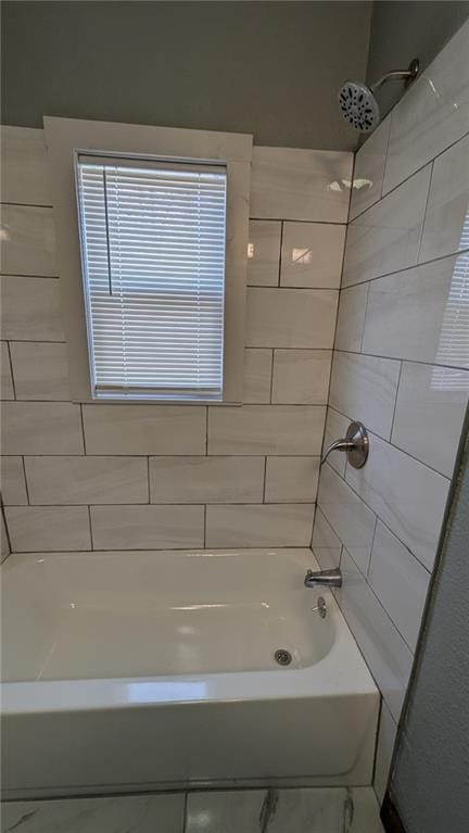 full bath featuring washtub / shower combination