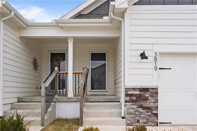 doorway to property featuring a garage