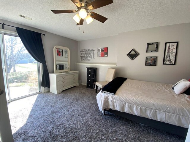 bedroom with visible vents, a ceiling fan, a textured ceiling, carpet floors, and access to exterior