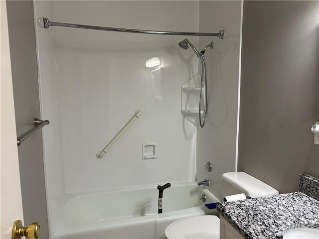 bathroom with toilet, shower / bath combination, and vanity