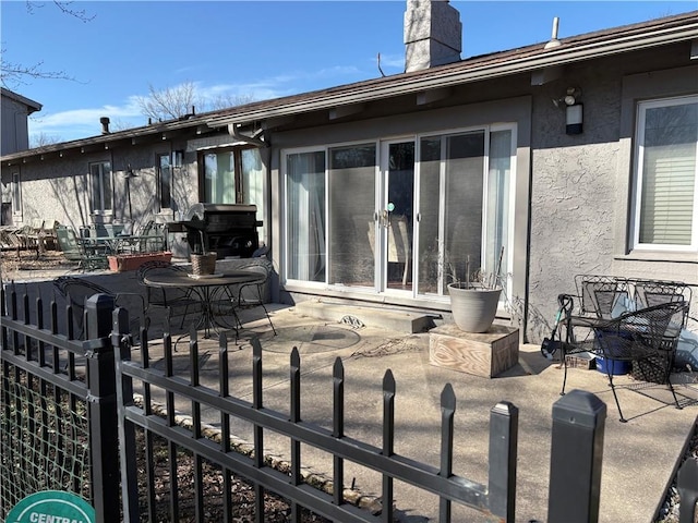 view of patio with fence