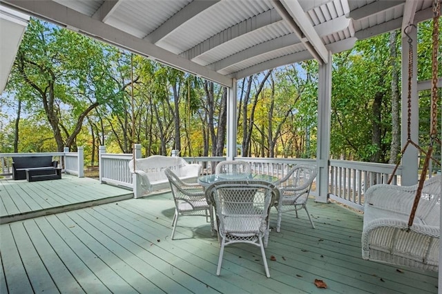 deck with outdoor dining space