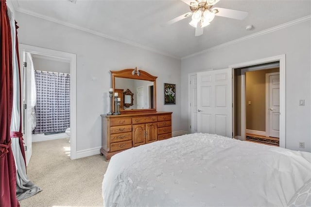 bedroom with carpet floors, baseboards, ornamental molding, and a ceiling fan