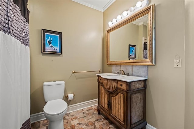 full bathroom with toilet, baseboards, ornamental molding, and vanity