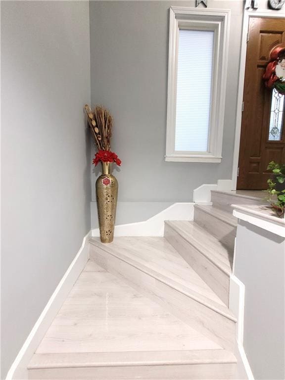 staircase with baseboards