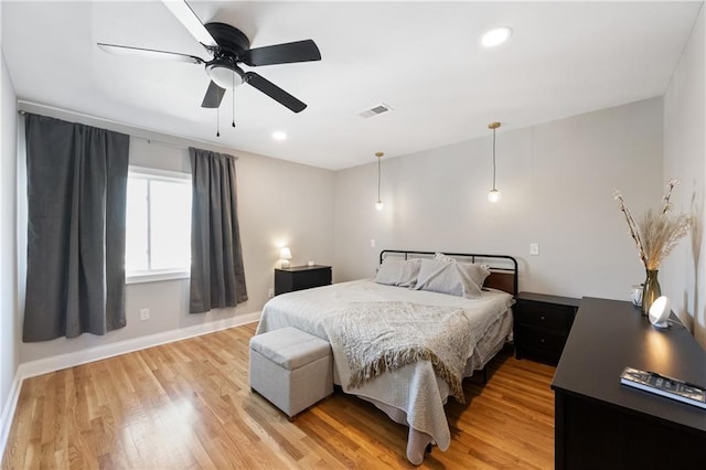 bedroom with visible vents, baseboards, recessed lighting, light wood-style flooring, and a ceiling fan