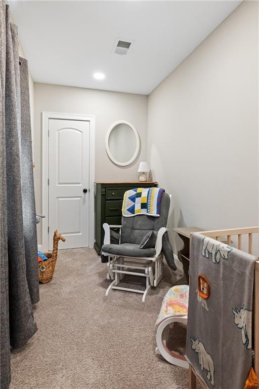 miscellaneous room featuring carpet and visible vents