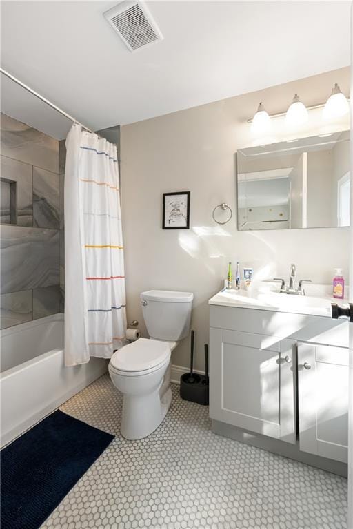 full bathroom featuring visible vents, toilet, vanity, and shower / tub combo with curtain