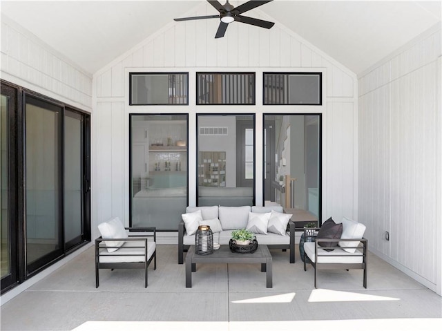 view of patio featuring a ceiling fan and an outdoor living space