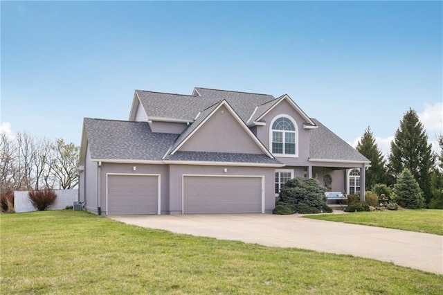 craftsman inspired home featuring roof with shingles, a front lawn, driveway, a garage, and stucco siding
