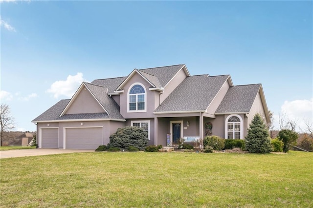 craftsman-style home featuring concrete driveway, an attached garage, a front yard, stucco siding, and roof with shingles