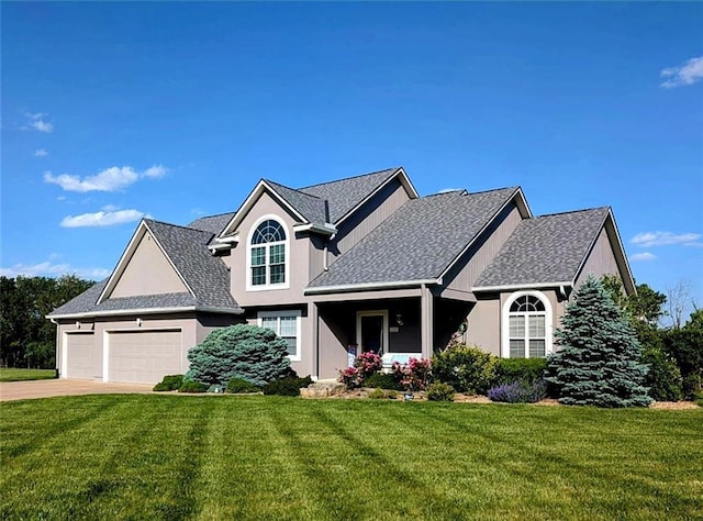 11319 Easley Dr, Lees Summit, MO 64086 - traditional-style home with a front lawn, a garage, driveway, and stucco siding