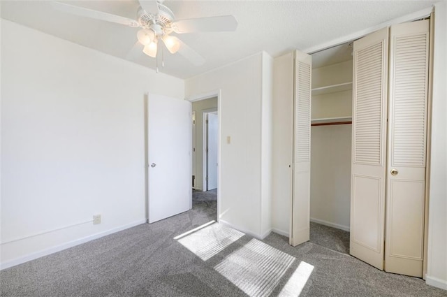 314 N 6th St, Leavenworth, KS 66048 - unfurnished bedroom with ceiling fan, a closet, baseboards, and carpet flooring