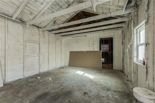 interior space featuring vaulted ceiling