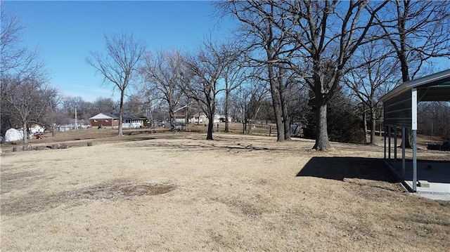 view of yard featuring a carport