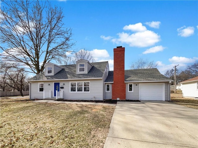 cape cod-style house with a garage, driveway, roof with shingles, a front lawn, and a chimney