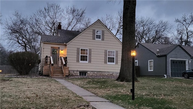 bungalow with a chimney, a front yard, and roof with shingles