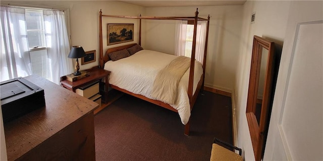 bedroom with multiple windows