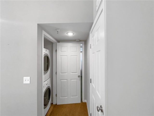 washroom with laundry area and stacked washer and clothes dryer