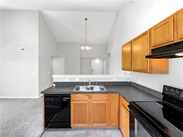 kitchen featuring dark countertops, a sink, a peninsula, under cabinet range hood, and black appliances