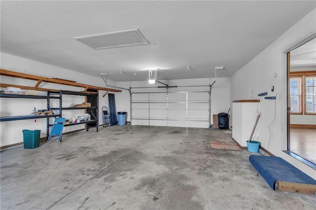 garage featuring baseboards