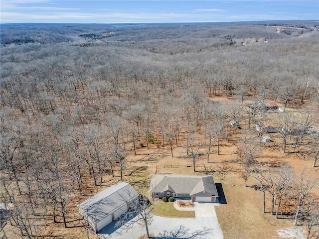 bird's eye view with a forest view