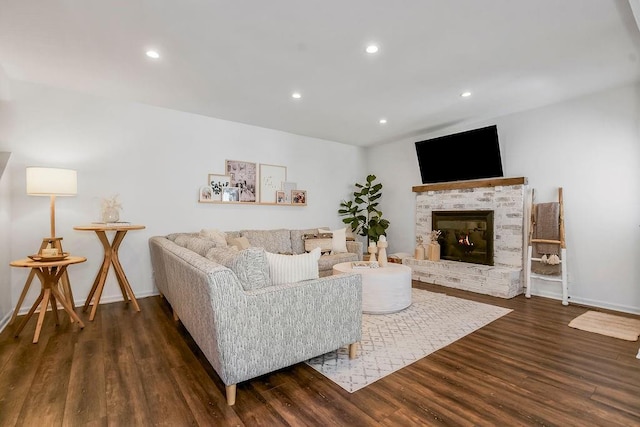 15905 W 152nd Ter, Olathe, KS 66062 - living area with dark wood-style flooring, a brick fireplace, and recessed lighting