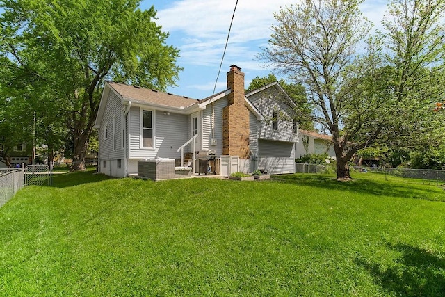 15905 W 152nd Ter, Olathe, KS 66062 - rear view of house with a chimney and a fenced backyard