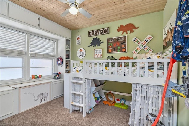 carpeted bedroom featuring wood ceiling