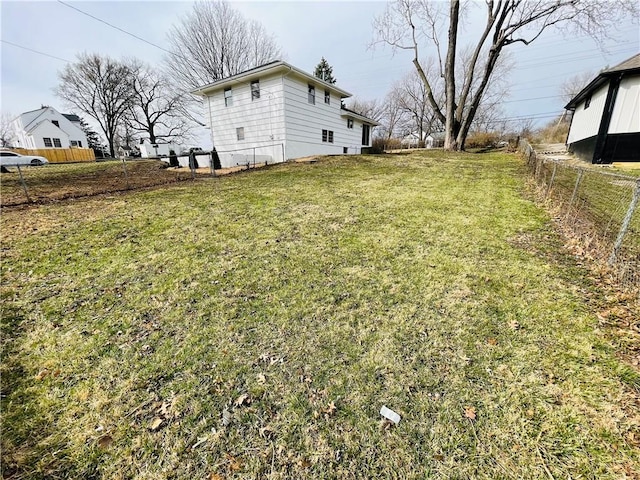 view of yard with fence