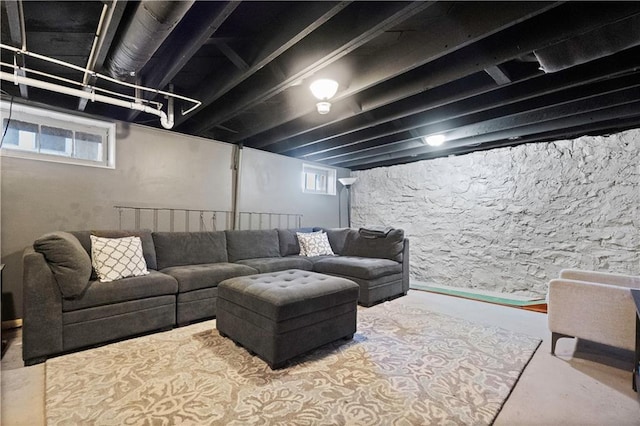 living area featuring concrete flooring