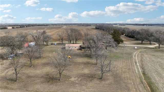 birds eye view of property with a rural view