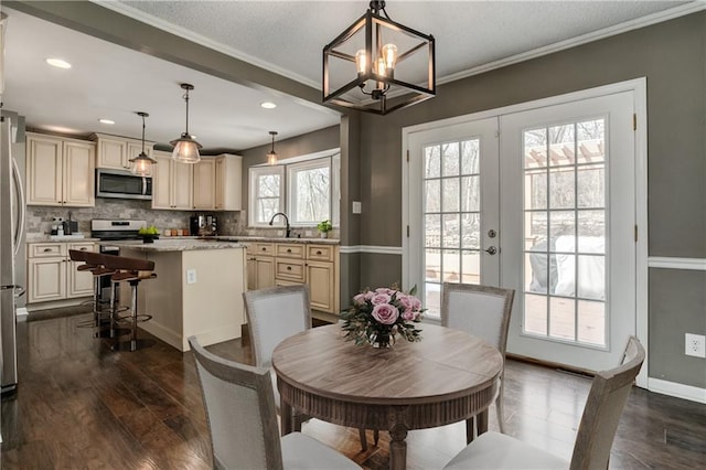 dining area with baseboards, ornamental molding, dark wood-style flooring, french doors, and recessed lighting