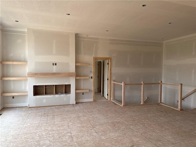 4524 N 86th Ter, Kansas City, MO 64156 - unfurnished living room with a textured ceiling