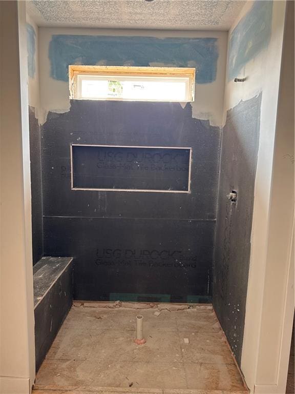 4524 N 86th Ter, Kansas City, MO 64156 - bathroom with healthy amount of natural light and a textured ceiling