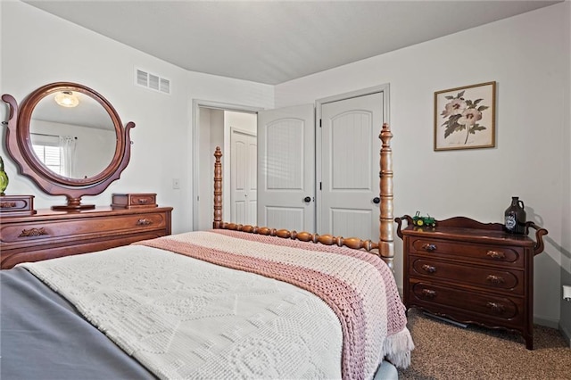 bedroom with carpet flooring and visible vents