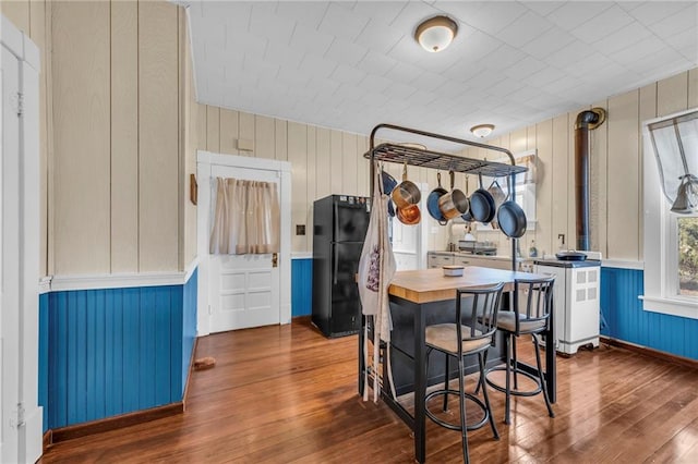 dining room featuring hardwood / wood-style flooring