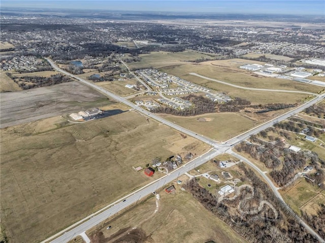 birds eye view of property featuring a rural view