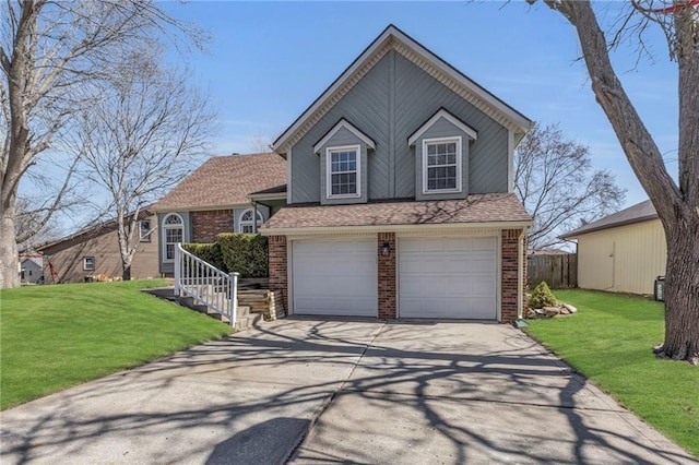 split level home with brick siding, concrete driveway, and a front lawn