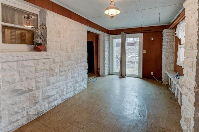 unfurnished room featuring tile patterned floors