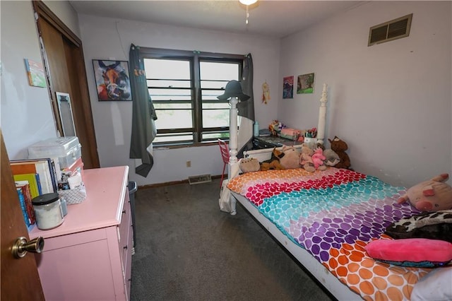 bedroom featuring carpet, visible vents, and baseboards