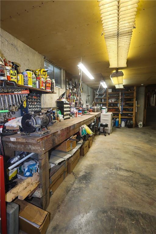 garage with a workshop area