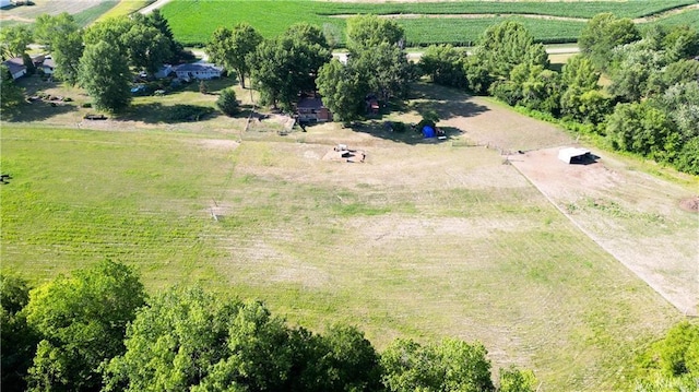 birds eye view of property with a rural view