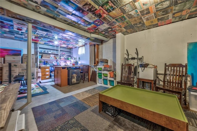 playroom featuring concrete floors