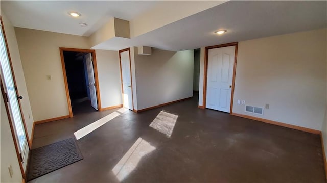 finished basement with recessed lighting, baseboards, and visible vents