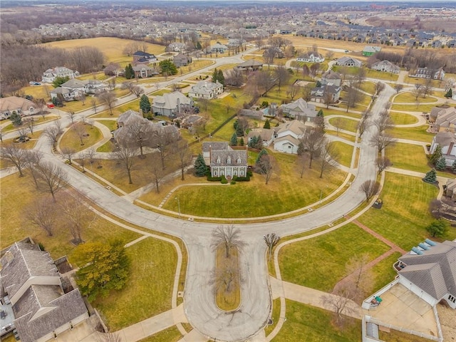 birds eye view of property with a residential view