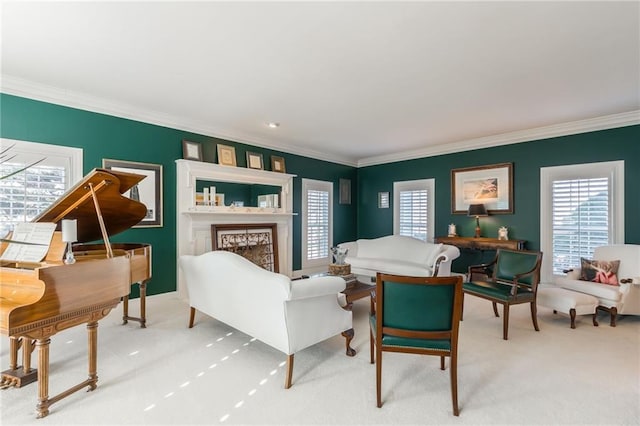 living room featuring plenty of natural light, light colored carpet, and ornamental molding