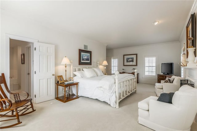 bedroom with visible vents, light carpet, and crown molding