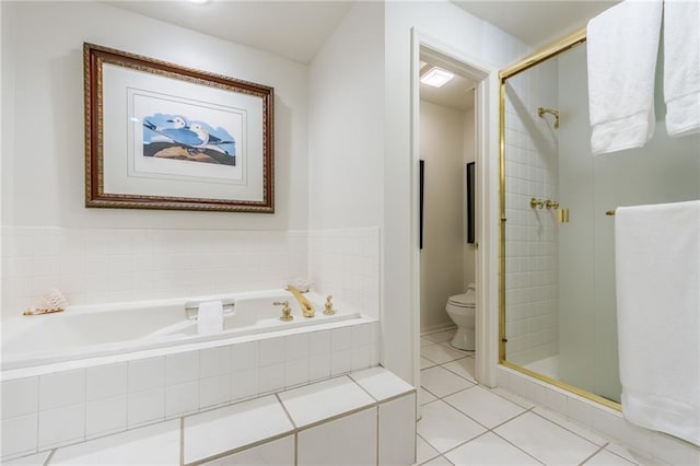 full bathroom with tile patterned floors, toilet, a stall shower, and a bath